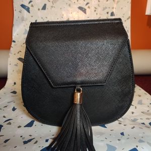 Black vegan leather vintage purse with tassel